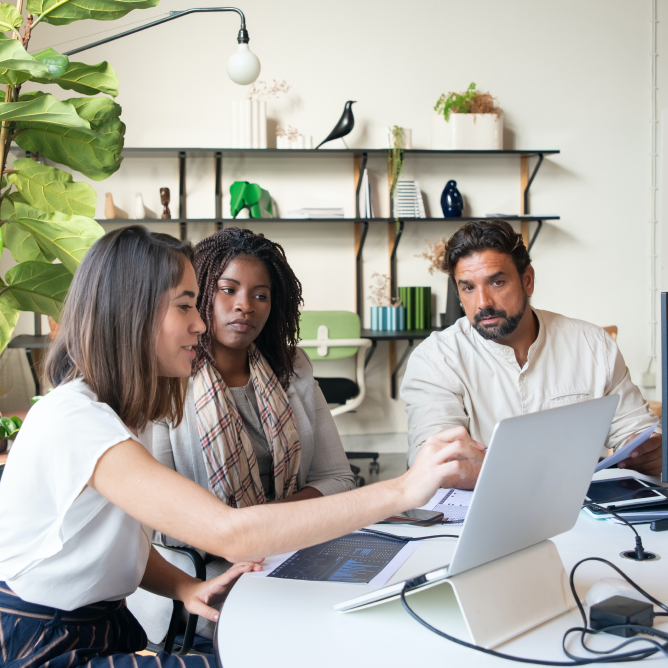 A Group of People Having a Meeting in the Office