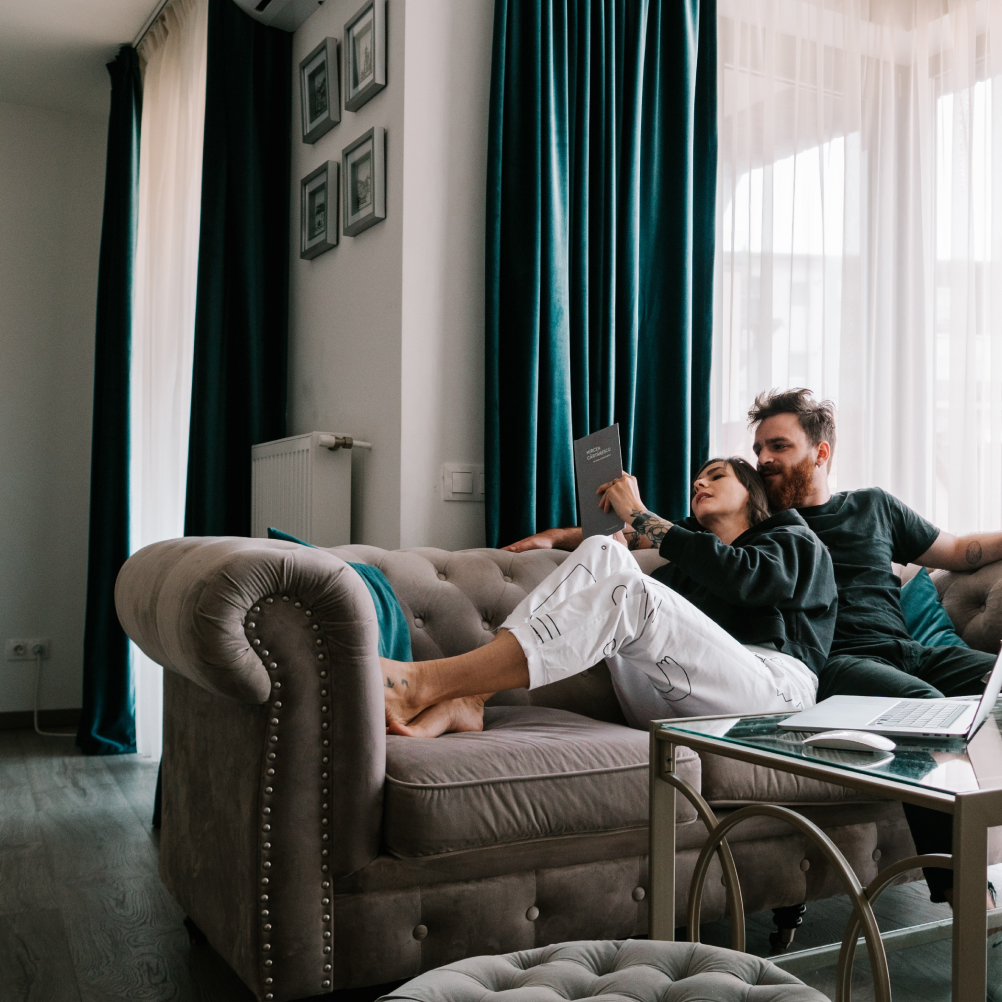 Couple relaxing on couch