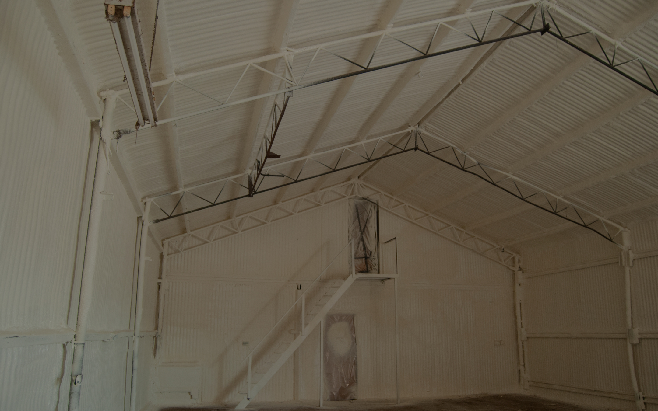 Inside of large, spray foamed shed